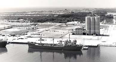 Continental Cement silos and tanker berths on the south side of the Port. (Port Canaveral image)