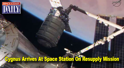The Cygnus resupply craft is attached to the Canadarm2 while being guided to the Harmony node for installation. (NASA.gov image)