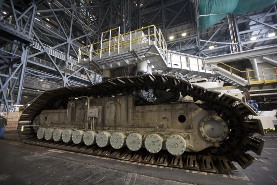 Crawler-transporter 2 (CT-2) enters the Vehicle Assembly Building at NASA's Kennedy Space Center in Florida on Jan. 31, 2014. Visible are the new roller bearing assemblies that were installed on one side of the crawler. GSDO recently completed a roller bearing assembly test on CT-2. (NASA.gov image)