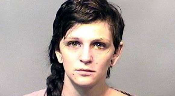 Stephanie Marie Moore, 20, one of two women seen in photographs last July where they appeared to be sitting or riding on sea turtles, was arrested Saturday, according to the Melbourne Police Department. (MPD image)