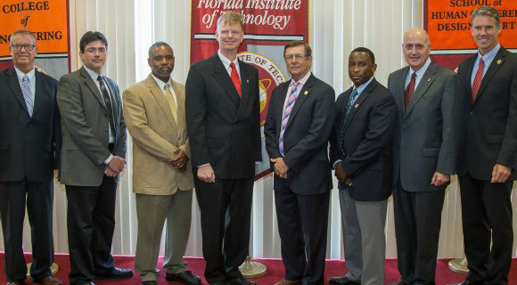 Attending The Announcement Wednesday Of A New Cooperative Research And Development Agreement Between Florida Institute Of Technology And The Air Force Technical Applications Center (Aftac) Were, From Left, William Mckendree, Bill Junek, Josef Allen And Glenn Sjoden, All From Aftac, T. Dwayne Mccay And Anthony Smith, Both From Florida Tech, Daniel Deforest From Aftac, And Tristan Fiedler From Florida Tech. (U.S. Air Force photo by Susan A. Romano)