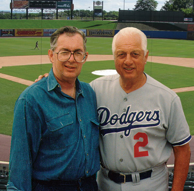 PAIR OF HALL OF FAMERS: Rick Stottler, left, with Tommy Lasorda.