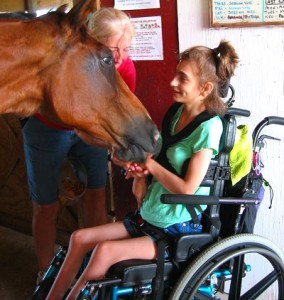 RIDERS AT HARMONY FARMS are coping with disabilities such as cerebral palsy, Down’s syndrome, autism, multiple sclerosis and stroke. “Horses give legs to riders who can’t move their legs,” said Pam Rogan, founder of Harmony Farms. (Image for Space Coast Daily)