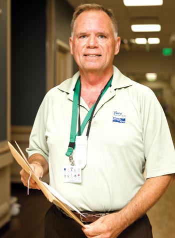 STEPHEN TOWERS of Viera Hospital has been on the job since the facility opened in April 2011. He is team leader for the hospital’s Emergency Department Volunteer Services where he ensures that more than 60 volunteers in the department are fully trained. (Space Coast Medicine & Active Living image)