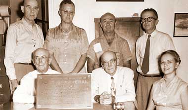 Photo above: Seated are N.M. Agrabite, Executive Treasurer; Chairman N.B. Butt, Secretary Barbara Smith. Standing left to right are Vice Chairman A.A. Dunn, and Commissioners G.W. Laylock, Dave S. Nisbet, and L.M. Carpenter. (Port Canaveral image)