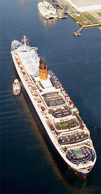 Queen Elizabeth II made her first visit to Port Canaveral in December 1980. At the top of the photo, the USNS Hayes is berthed at North Cargo Pier 3. (Port Canaveral image)