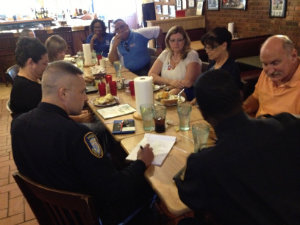 Rockledge Police Chief Jospeh LaSata takes notes while listening to principals from local schools. (SpaceCoastDaily.com image)