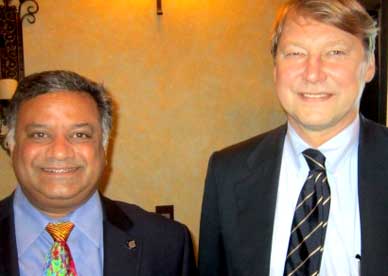 Glad Kurian, left, welcomes speaker Hartmuth Bittner, MD and a Surgical Director for the Florida Hospital Transplant Institute. (SpaceCoastDaily.com image)