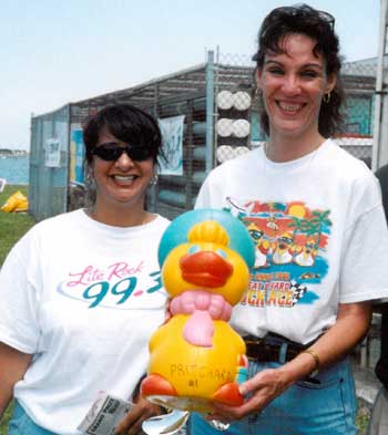 SHANNON WILSON at the Great Brevard Duck Race, a major fund-raiser for Croswinds, with Mindy of Lite Rock 99.3. (Image for Space Coast Medicine & Active Living)