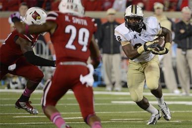 UCF Knights running back William Stanback (28) runs the ball against the Louisville Cardinals during the second half of play at Papa John's Cardinal Stadium. (UCFKnights image)