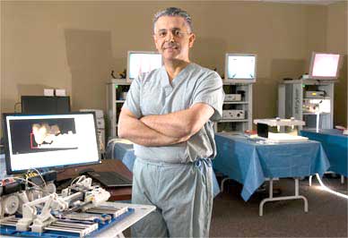 Dr. Mehran Anvari, chief executive officer and scientific director at the Centre for Surgical Invention and Innovation, with the Image-Guided Autonomous Robot (IGAR) manipulator. (NASA.gov image)