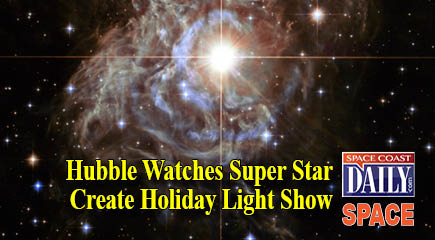 This festive NASA Hubble Space Telescope image resembles a holiday wreath made of sparkling lights. The bright southern hemisphere star RS Puppis, at the center of the image, is swaddled in a gossamer cocoon of reflective dust illuminated by the glittering star.