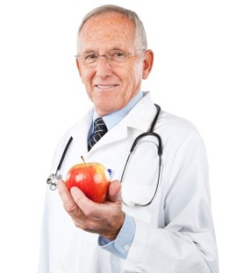 old-doctor-holding-apple