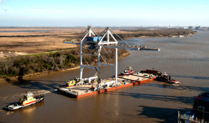 Port Canaveral’s first ship-to-shore cranes arrived via barge after a 325-mile journey from the Port of Savannah. (Port Canaveral image)