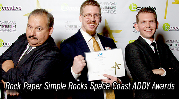 Rock Paper Simple web agency 'Head Honcho,' Joshua Adams is flanked by staff members Jerry Olguin (left) and Russ Wood. Rock Paper Simple won a Gold and Silver award from the American Advertising Federation in February. (David Sanders image)