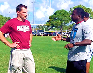 Florida Tech Foootball head coach Steve Englehart discusses the daily camp schedule with Michael Cadore