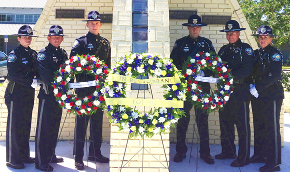 Officers Gerald Johnson and Ronald Grogan were killed by a gunman who went on a shooting rampage that also killed four citizens and wounded 14 others on April 23, 1987. During a special memorial ceremony held Wednesday morning members of the police department Honor Guard carried wreaths of flowers and placed them at a memorial at Sacrifice Park located across the street from the police department next to the Degroodt Library. (PBPD image)