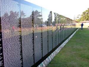 John Devitt, founded The Moving Wall in 1984 after attending the 1982 dedication at The Vietnam Veteran Memorial in Washington DC. The Moving Wall is a half sized replica of the memorial, visiting every state in the US including Puerto Rico, Canada, Guam, and Saipan. It has been displayed 1,294+  times.  