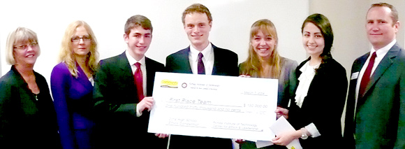 The winning team from West Shore Junior/Senior High School receives its scholarship and cash awards check. Above, left to right, are Deborah Blair, Community Credit Union; Annie Becker, dean, Bisk College of Business; Caleb Bryant; Will Clifton; Lexie Krehbiel; Ilana Krause; and Abram Walton, director, Bisk College of Business Center for Ethics and Leadership. (Florida Tech image)