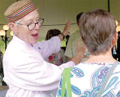 Deb Lindsay of Matt’s explains the food stations which featured Katahdin lamb, pasture-raised, forage-fed lamb, and Angus beef, 100 percent grass-fed and grass-finished, dry-aged Angus beef with no hormones growth supplements or antibiotics. (Image for SpaceCoastDaily.com)