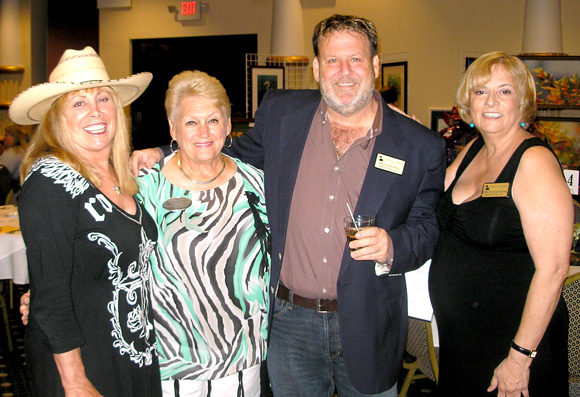 Artist Beth Carver, Pam Rogan, Harmony Farms founder and executive director, Veterinarian Brad Newman and Rose Munzenmayer, Harmony Farms board president. (Nancy Lundell image)