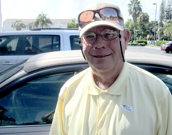 Dick Dunn, an 11 year resident of Indialantic, leaves the polls Tuesday morning after voting at Eastminster Presbyterian Church in Indialantic.