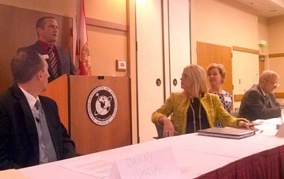 Florida Attorney General Pam Bondi meets with South Brevard County business leaders, left to right, Abe Walton of Florida Tech,  Cathy Cobb of Eastern Florida and Chuck Galy of the Melbourne Regional Chamber of Commerce. (Charles Parker image)