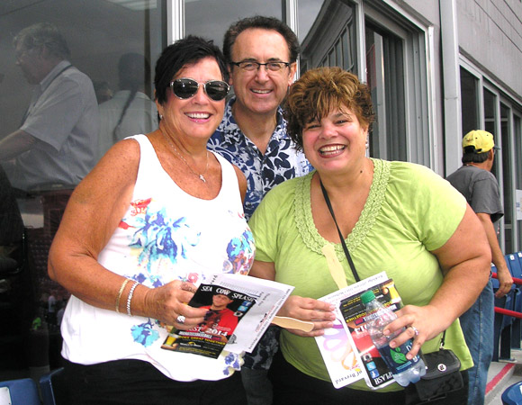 LEFT TO RIGHT: Terri Scarboro, Dr. Giuseppe Palermo and Gail Erentreich waiting for the game to start at Strike Out Cancer Night at Space Coast Stadium. (Nancy Lundell image)