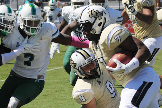 Dontravious Wilson, above, rushed for 51 yards on 13 attempts. (Rhett Lighthall image)