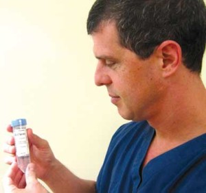 STEM CELL THERAPY: Dr. Jeff Christiansen sends a small sterile sample of an animal’s own tissue to a lab for harvesting. 