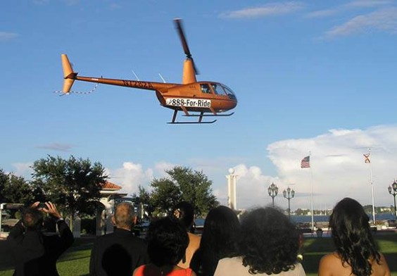 The appearance and sound and of the helicopter was designed to evoke the emotional helicopter scene in “Miss Saigon,” which opens this year’s theater season.  It was also a great way to help introduce Florida Bi Planes and Helicopters, a recently launched local business providing air tours of the area (Nancy Lundell image)