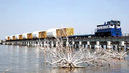 Brevard County District 2 Commissioner Jim Barfield introduced a resolution opposing a cargo railway from the north side of the port over the Banana River, citing environmental issues and negative effects on North Merritt Island residential areas. (NASA image)