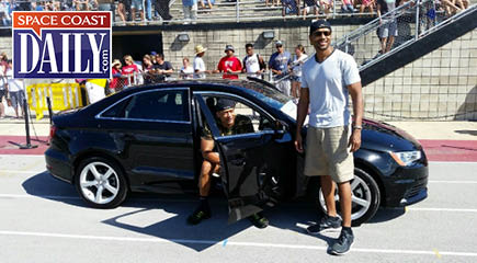 When Brian Ashley, a native of Orlando and the uncle of Florida Tech punter/kicker Brion Ashley, made his throw to the 17-yard line, everyone in the stadium knew he had a chance. With a brand new 2015 Audi A3, courtesy of Mercedes-Benz, Porsche, Audi of Melbourne, on the line, Ashley lined up to attempt a 27-yard field goal. (Image for SpaceCoastDaily.com)