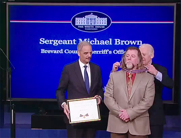 Vice President Joe Biden and Attorney General Eric Holder hosted a Medal of Valor ceremony on Wednesday that honored Sergeant Michael Brown of the Brevard County Sheriff’s Department. (White House video image)