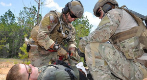 Springfield native and Air Force Technical Sergeant Daniel Warren and another pararescueman perform patient care and packaging during a Mass Casualty exercise in Louisiana. (Image for SpaceCoastDaily)