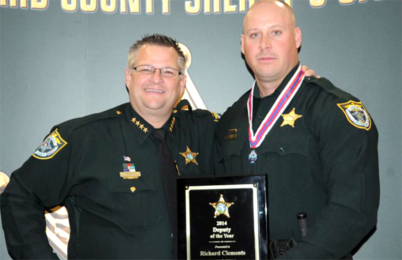 The Brevard County Association of Chiefs of Police selected Brevard County Sheriff's Agent Rick Clements, above right with Sheriff Wayne Ivey,  Law Enforcement Officer of the Year during the organization's annual banquet held on Wednesday evening. (BCSO image)