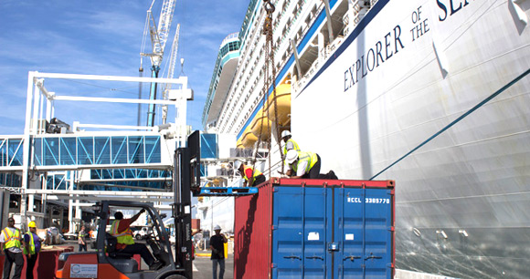 Local logistics, transportation, stevedoring and security experts came together to load about 40 ocean containers and 30 tractor trailers onboard cruise ship Explorer of the Seas, bound for drydock in Spain. (Image for SpaceCoastDaily.com)