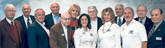 Front, from left: Maxwell King, Dennis Hepburn, Bob Lawton, Teri Scott, Robi Roberts, Bob Socks, Ed Lanni Back, from left: Mike Gautreaux, Jim Handley,Susie Wasdin, Bill Bancroft, Chuck Rowland, Jay Honeycutt