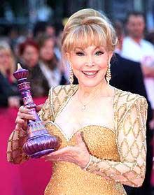 Barbara Eden will make an appearance at the awards ceremony of the Inaugural Ron Jon Cocoa Beach Half Marathon. The sold out running event features an “I Dream of Jeannie” theme and finishes on “I Dream of Jeannie Lane” in Lori Wilson Park. All finishers will receive Jeannie Bottle medals. (wikipedia.org image)