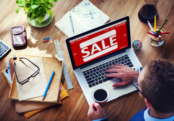 A study of 2,000 people in the USA has found that people aiming for the best Black Friday deals intend to shop online during work time. (Shutterstock image)