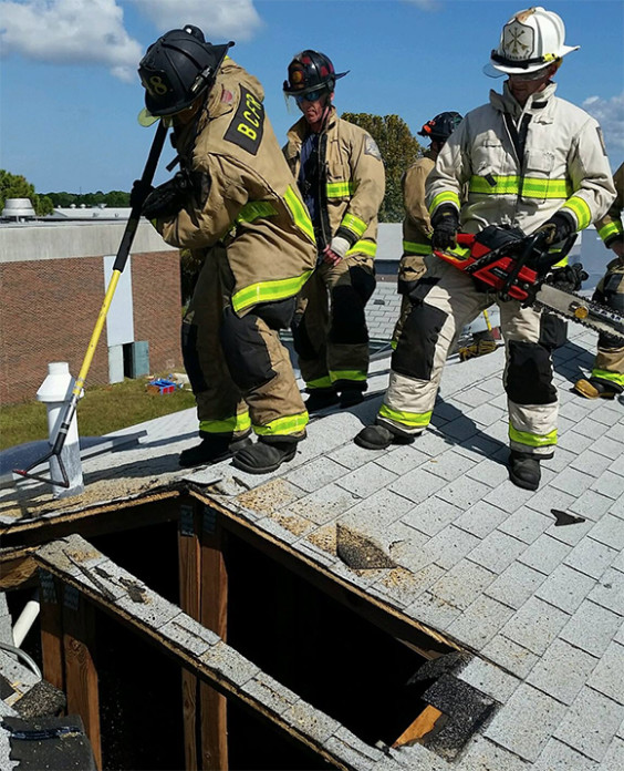 Brevard County Fire Rescue instructors practice in preparation for the Truck Company Operations training. (BCFR image)