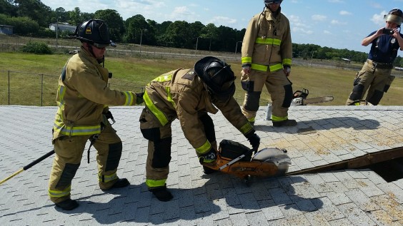 Brevard County Fire Rescue instructors practice in preparation for the Truck Company Operations training.