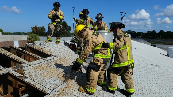 Brevard County Fire Rescue instructors practice in preparation for the Truck Company Operations training. (BCFR image)