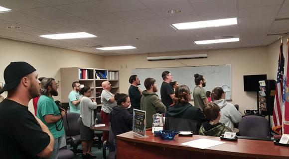 Members of the Cocoa Campus Chapter of the Collegiate Veterans Society recite the Pledge of Allegiance during a recent meeting at the expanded EFSC Military and Veterans Service Center. (Eastern Florida image)