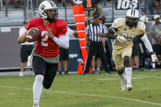 Quarterback Nick Patti rolling outside the pocket at the 2016 UCF Spring Game. (Colin Ziemer, Space Coast Daily Image)