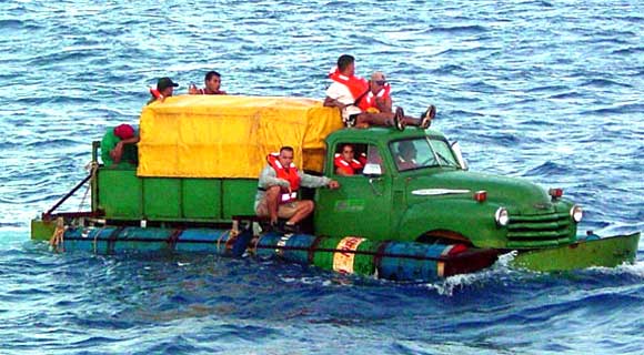  US Coast Guard picture shows Cuban migrants trying to cross the Straits of Florida on a 1951 Chevy flatbed truck turned into a "pontoon" boat. (Gregory Ewald/US COAST GUARD/AFP/File)