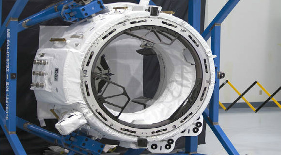 The International Docking Adapter-2 was tested in the Space Station Processing Facility prior to being loaded for launch into space. (NASA Image)