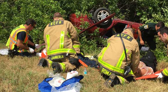 Two people were taken to the hospital after being injured in a single-vehicle rollover crash on I-95 on Friday afternoon about 3:30 p.m. (BCFR image)