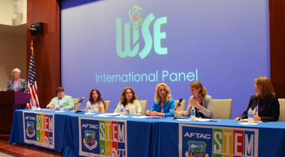  Dee-Anna Wells, far left, moderates a panel during the 2016 Women in Science and Engineering (WiSE) Symposium Sept. 9, 2017 hosted by the Air Force Technical Applications Center, Patrick AFB, Fla. Seen in this photo from left to right are: Diane Fischer, senior safeguards analyst and team leader for International Atomic Energy Agency; Dr. Jane Collins, principal scientist with Atomic Weapons Establishment; Dr. Nurcan Meral Ozel, director of the International Monitoring System Division of the Comprehensive Test Ban Treaty Organization; Dr. Mihaela Popa, manager of the Romanian National Data Center; Sue Collins, operations research analyst at NATO's Allied Command Transformation office; and Dr. Candace Eshelman-Haynes, capability development in the technology and human factors branch of the NATO ACT office. (U.S. Air Force photo by Matthew Jurgens)