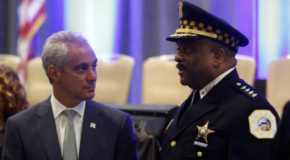 Chicago Mayor Rahm Emanuel looks to Eddie Johnson, the cities Police Superintendent. (Chicago Sun Times Image)